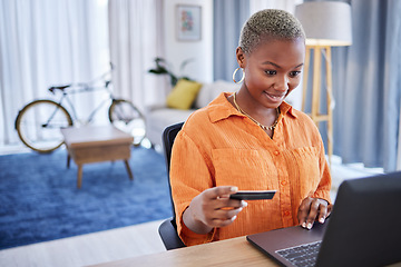 Image showing Excited, laptop or black woman with credit card in home for ecommerce sale on digital fintech website. Finance, payment discount or happy girl online shopping or banking on internet typing in pin