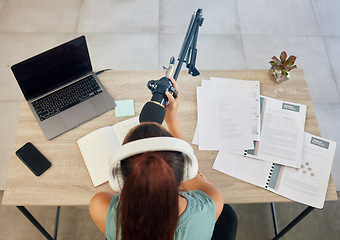 Image showing Microphone, laptop and woman on podcast from above for live stream, media broadcast or webinar. Streaming, influencer or content creator with mic, elearning and networking online class in home office