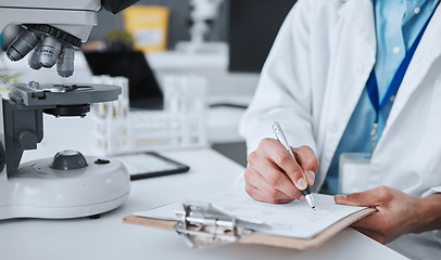 Image showing Research, writing and science with hands of man in laboratory for report, pharmacy and medical. Checklist, healthcare and medicine with closeup of scientist and clipboard for data, vaccine and study