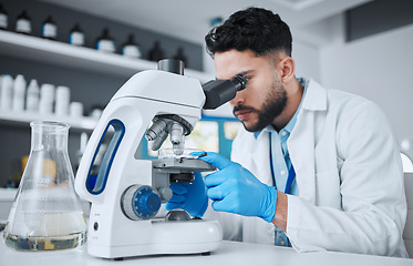 Image showing Microscope, science and research with man in laboratory for pharmacy, medical and vaccine. Chemistry, healthcare and medicine with scientist and study for solution, development and sample results