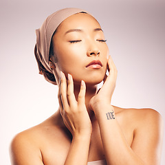 Image showing Asian woman, beauty and skincare in studio for makeup, glow, soft touch and cosmetic results by background. Japanese model, girl and eyes closed for wellness, aesthetic and change for skin health