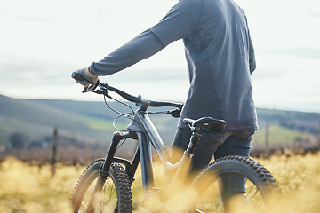 Image showing Extreme sports, cycling and man with bicycle in nature for training, workout and exercise in countryside. Fitness, cyclist and person with mountain bike for adventure, freedom and ride on dirt road