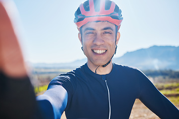 Image showing Selfie, portrait or happy man cycling by mountains on countryside in Switzerland for fitness. Face, smile or sports athlete biker with photo or profile picture in training, workout or exercise trip