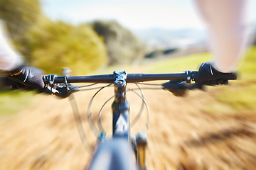 Image showing Fitness, cycling and person pov on bike in nature for extreme sports, race or training with motion blur. Bicycle, exercise and cyclist riding on dirt road with energy, adrenaline or speed challenge