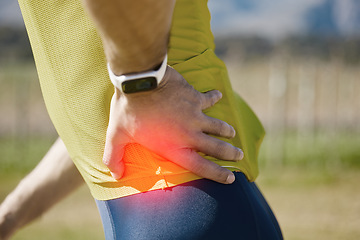 Image showing Biker, hand or man with hip pain, injury or inflammation outdoors with torn muscle, strain or bruise. Cyclist, injured waist or sports athlete with accident, red glow or emergency in fitness training