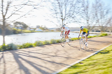 Image showing Fitness, team or men cycling on bicycle for training, cardio workout or race exercise in park together. Fast speed, healthy friends or sports athletes riding bike on road or path for a fun challenge