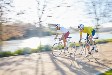 Image showing Bicycle race, men and street with motion blur, speed or sports for fitness, countryside and summer. People, fast cycling or friends with training partnership, workout or exercise on journey in nature