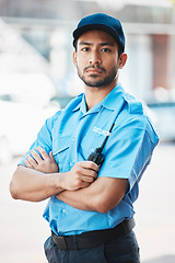 Image showing Security guard, safety officer and portrait of a man on street for protection, patrol or watch. Law enforcement, serious and walkie talkie of a crime prevention male worker in uniform outdoor in city