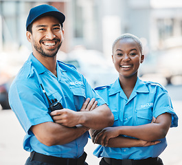 Image showing Security guard, safety officer and team portrait on the street for protection, patrol or watch. Law enforcement, happy and smile of crime prevention man and black woman in uniform outdoor in the city