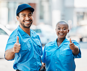 Image showing Security guard, safety officer and team thumbs up on street for protection, trust or support. Law enforcement, happy and hand sign of crime prevention man and black woman in uniform outdoor in city