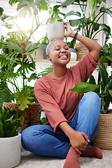 Image showing Portrait of a black woman, garden and happy with plant on head and care for plants, leaves and sunshine in greenhouse. Gardening, growth and person with houseplant and happiness