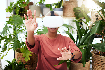 Image showing Woman, virtual reality and headset with hands at home for metaverse, 3d world or future. Black person with plants and vr glasses for ecology, ai and touch for interaction, video game or experience