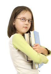 Image showing Young girl with books