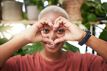 Image showing Black woman, portrait and heart hands for love, sign or shape for health and wellness in eco friendly store. Face of happy African female person with loving emoji, symbol or gesture for natural care