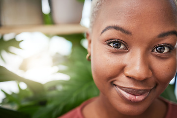 Image showing Portrait, plants and flare with a black woman gardener in her home for sustainability or green growth. Face, beauty and smile with a happy young female person in a nursery for eco friendly gardening