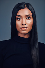 Image showing Face, natural and beauty of serious woman in studio isolated on a gray background. Portrait, skincare cosmetics and Indian model with spa facial treatment for aesthetic, healthy skin and wellness.