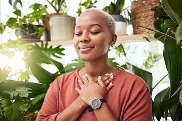 Image showing Balance, breathing and young woman by plants for zen meditation in a greenery nursery. Breathe, gratitude and young African female person with a relaxing peace mindset by an indoor greenhouse garden.