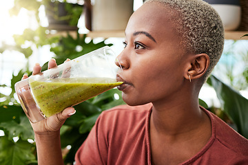 Image showing Black woman, diet and drinking natural smoothie for vitamins, fiber or health and wellness in store. Face of African female person with healthy beverage, drink or organic fruit juice to lose weight