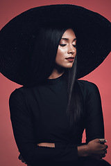 Image showing Fashion, woman in hat with beauty and makeup, elegance and glamour with luxury isolated on studio background. Designer clothes, black aesthetic and female model with style, vintage and cosmetic shine
