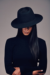 Image showing Fashion, woman in hat and beauty, dark and mystery with glamour and luxury isolated on studio background. Designer clothes, black aesthetic and female model, vintage style with cosmetics and edgy