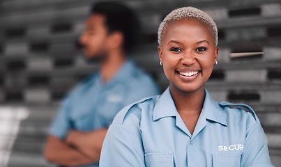 Image showing Portrait, security or safety and a happy black woman in the city with a man colleague on the street. Law enforcement, smile and duty with a crime prevention unit working as a team in an urban town