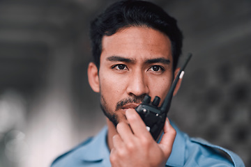 Image showing Security guard, walkie talkie or safety officer man outdoor for protection, patrol or watch. Law enforcement, serious face and duty with a crime prevention male worker in uniform for communication