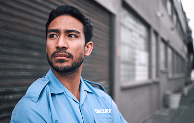 Image showing Serious, security guard or safety officer man on the street for protection, patrol or watch. Law enforcement, focus and duty with a crime prevention male worker in uniform in the city