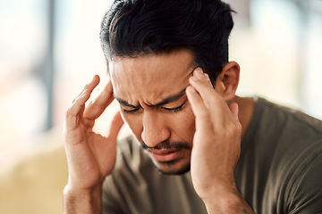 Image showing Man, headache and pain in home from stress, mental health fatigue and mind problem. Face, sick and depression of frustrated male person in anxiety, brain fog and dizzy from failure, worry and vertigo