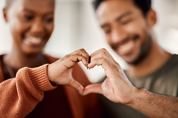 Image showing Love, heart and happy with hands of couple for solidarity, romance and support. Kindness, happiness and relationship with closeup of man and woman with emoji shape at home for care, date and marriage