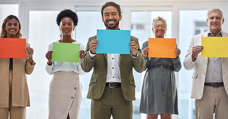 Image showing Creative people, portrait and color poster for advertising, marketing or branding in teamwork at the office. Group of happy employees with colorful paper, sign or card for startup at the workplace
