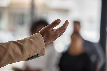 Image showing Hand, presentation and leadership with a coach in the boardroom teaching a a business team during a workshop. Management, training and a corporate boss talking to staff for education at a conference