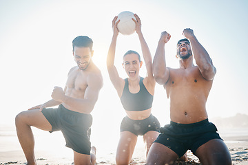 Image showing Happy people, volleyball and winning on beach in victory, achievement or teamwork celebration in the outdoors. Woman and men in team success, championship or game and match on the ocean coast outside