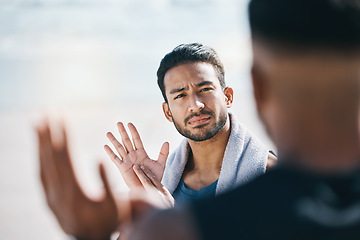 Image showing Sign language, communication and friends talking on the beach during summer vacation or holiday together. Face, conversation and travel with a young man chatting outdoor in nature by the ocean