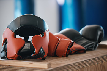 Image showing Fitness, boxing glove and workout for training in closeup in gym for mma competition for punch. Protection, exercise and fighting sport equipment at health centre for challenge or fight and wellness.