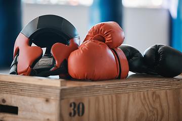 Image showing Gym, equipment and helmet with gloves for boxing fitness, commitment and inspiration in sports training. Kickboxing tools, safety and security in fight exercise, competition goals and fit motivation.