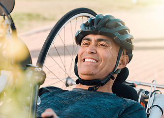 Image showing Happy man with disability, handcycle and bike for sports, race or cardio contest. Bicycle, male cyclist or face of athlete with paraplegia cycling in competition, challenge or smile of outdoor action