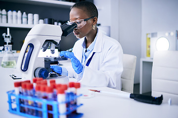 Image showing Science, laboratory and woman on microscope for blood test research, medical analysis and dna or virus tube. Biotechnology, healthcare and scientist, doctor or african person check for particles