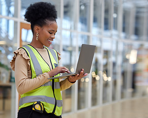 Image showing Project, woman and contractor with laptop at constriction site with architect or planning with employee. Engineer, working and technology with project management for renovation or maintenance.