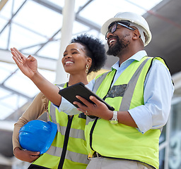 Image showing Tablet, teamwork or engineer talking to designer planning on a construction site for architecture. Building, collaboration or black woman or happy man working together to design a development project