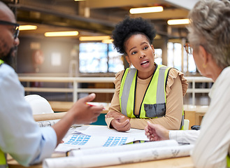 Image showing Architecture, meeting or civil engineering team planning a blueprint of a building or construction in office. Teamwork, collaboration or group of designers talking, speaking or working on floor plan