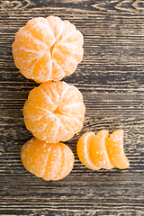 Image showing peeled orange tangerines