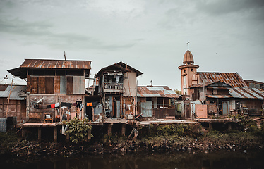 Image showing Poor houses and local people in Kota Manado ghetto, Indonesia