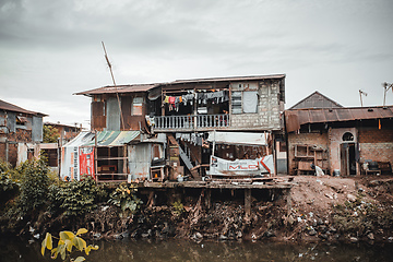 Image showing Poor houses and local people in Kota Manado ghetto, Indonesia