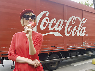 Image showing Kyiv, Ukraine - July 6, 2017 Beautiful fashionable woman with model release drinking Coca-Cola soda