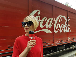 Image showing Kyiv, Ukraine - July 6, 2017 Beautiful fashionable woman with model release drinking Coca-Cola soda