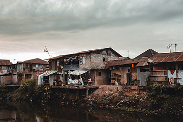 Image showing Poor houses and local people in Kota Manado ghetto, Indonesia