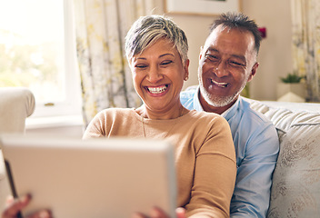 Image showing Happy, selfie and a couple with a tablet on the sofa for communication, social media or online chat. Smile, house and a senior man and woman taking a photo on technology on the couch and laughing