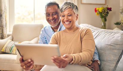 Image showing Tablet, video call and senior couple at home for communication, network connection or chat. Mature man and woman together with technology, social app and internet while laughing on a living room sofa