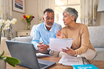 Image showing Laptop, documents and accounting with a senior couple in the home living room for retirement or finance planning. Computer, budget or investment savings with a mature man and woman in a house