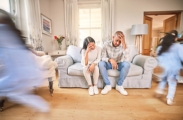 Image showing Motion blur, stress and parents with adhd children on a sofa in the living room of their home feeling burnout. Family, kids running or playing with a mom and dad eyes closed in a house for a break